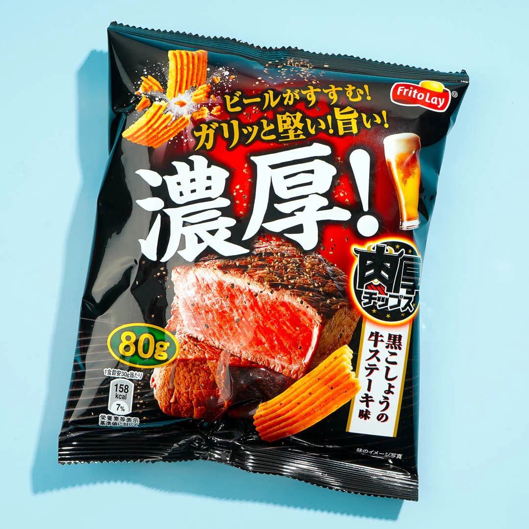 Front of Frito Lay Thick Cut Black Pepper Steak bag showing thick-cut crisps and robust steak flavour with a 80g pack size.