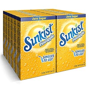 Front of Sunkist Pineapple Singles to Go pack showing bright yellow design, pineapple flavour label, and 12 pack size (198g)