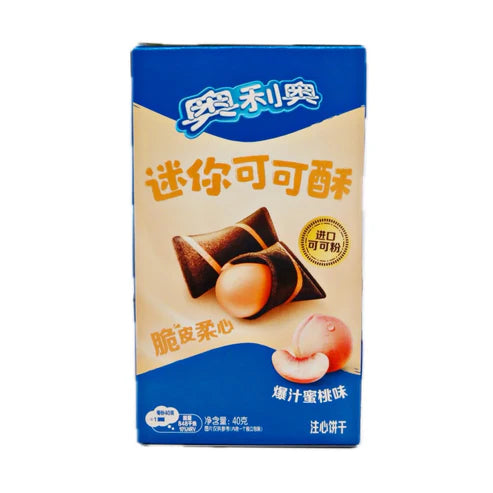 Front of Oreo Peach Cream-Filled Bites box showing logo, peach-flavoured cream-filled treats, and details of 40g pack.