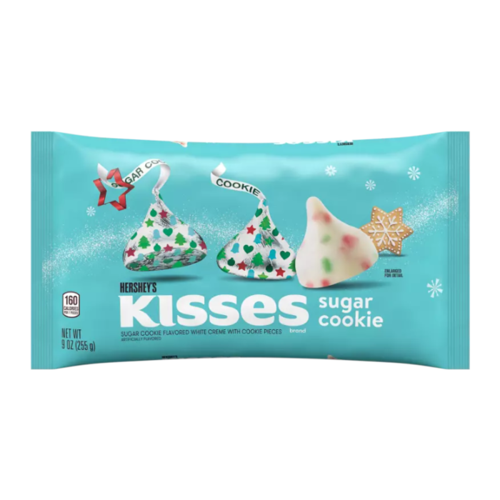 Front of Hershey's Christmas Kisses Sugar Cookie package showing blue background, festive Kisses with cookie designs, and product details (255g pack)