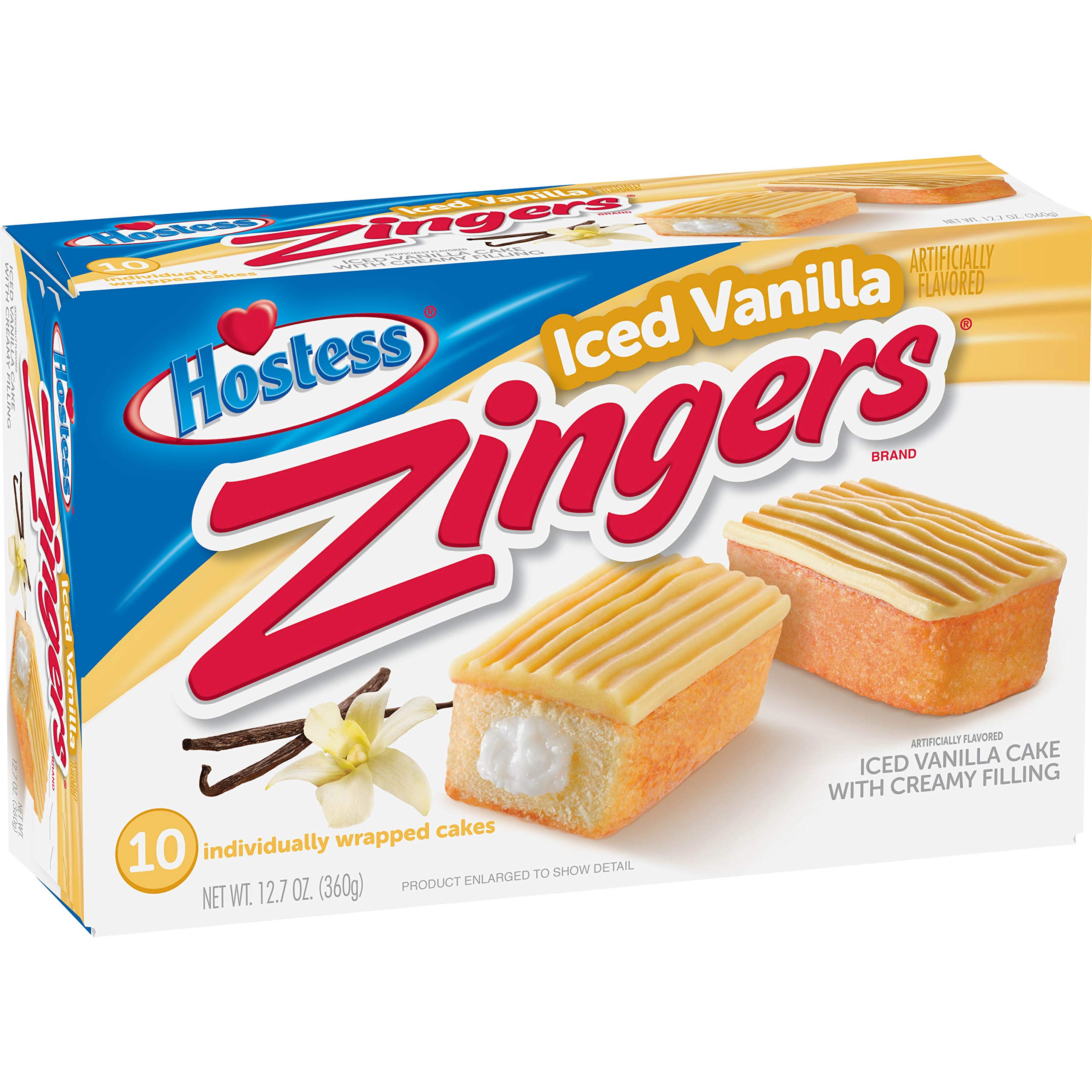 Front of Hostess Iced Vanilla Zingers box showing brand logo, iced vanilla cakes with creamy filling, and 10 individually wrapped cakes (360g pack)
