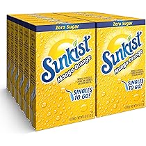 Front of Sunkist Mango Orange Singles to Go showing bright yellow packaging, brand logo, and drink mix details (144g, 12 pack)