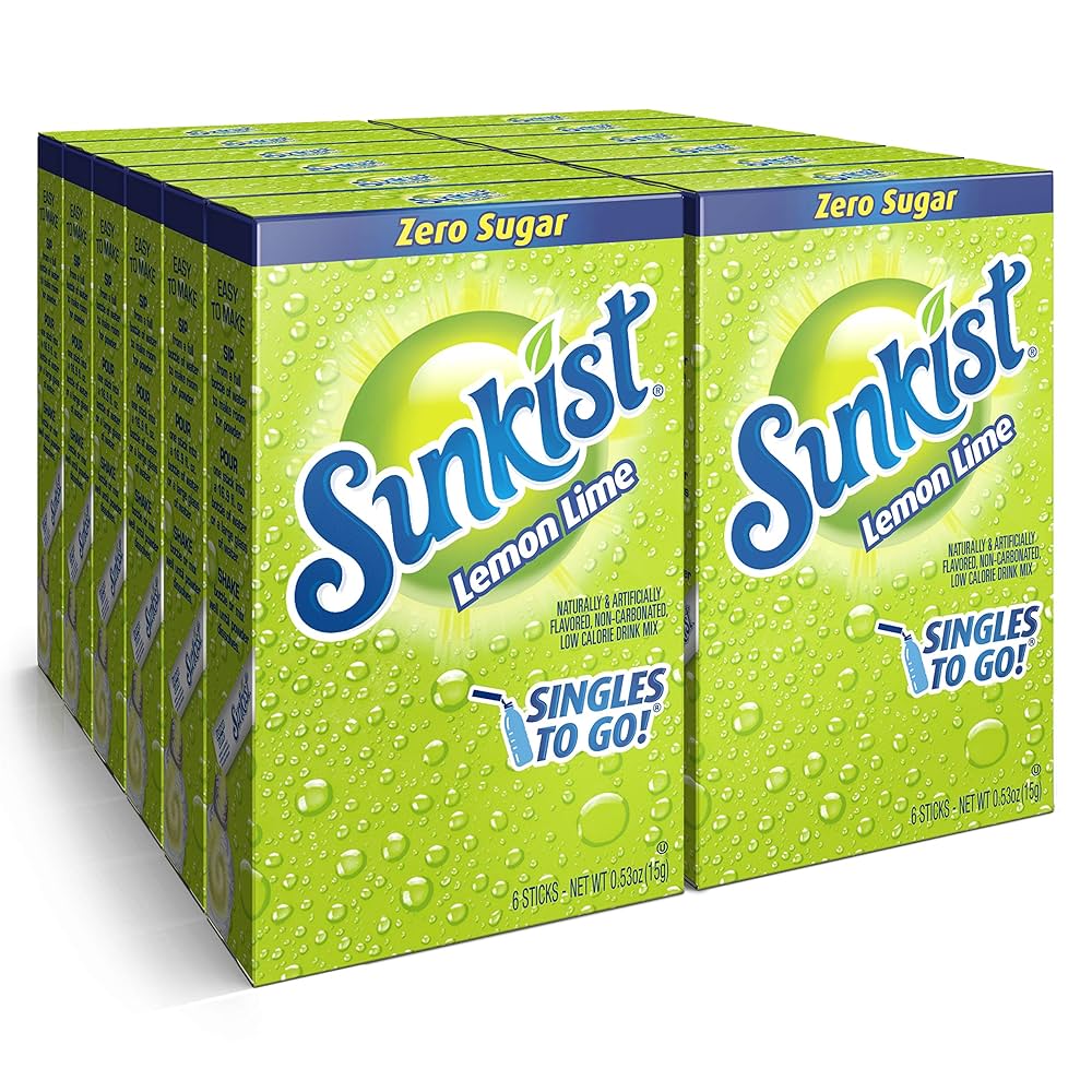 Front of Sunkist Lemon Lime Singles to Go box showing bright green packaging, logo, and text indicating zero sugar, with 6 sticks in a 180g pack.