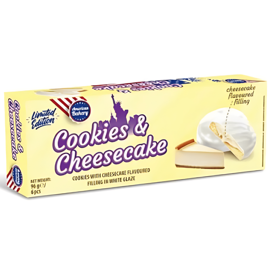 Front of American Bakery Cookies & Cheesecake box showcasing the product title, cheesecake flavour label, and white-glazed cookies (96g pack)
