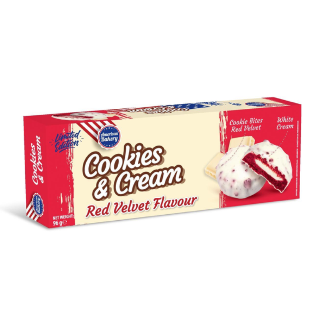 Front of American Bakery Cookies & Cream Red Velvet Flavour box showing logo, red velvet cookie bites, and white cream (96g pack)