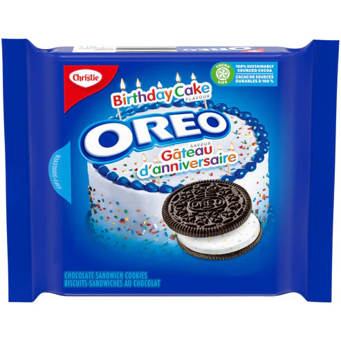 Front of Oreo Birthday Cake Cookies package featuring blue and white design, logo, and colourful sprinkles, 261g pack.