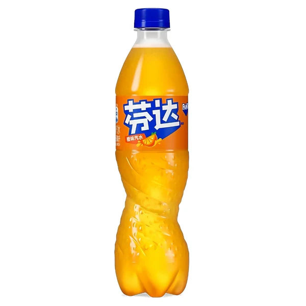 Front of Fanta Orange (China) bottle featuring bright orange label with logo and illustrations of oranges, 500ml pack size.