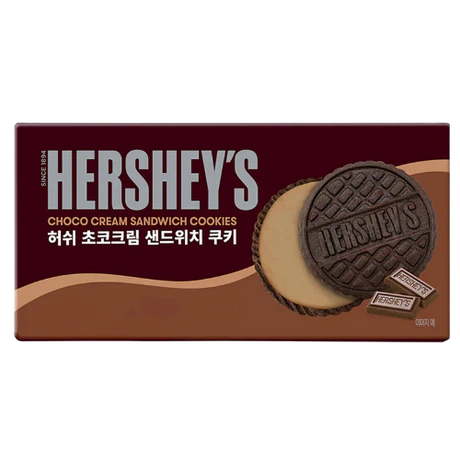 Front of Hershey's Choco Cream Sandwich Cookies pack featuring chocolate cookies with creamy filling and logo, 75g pack