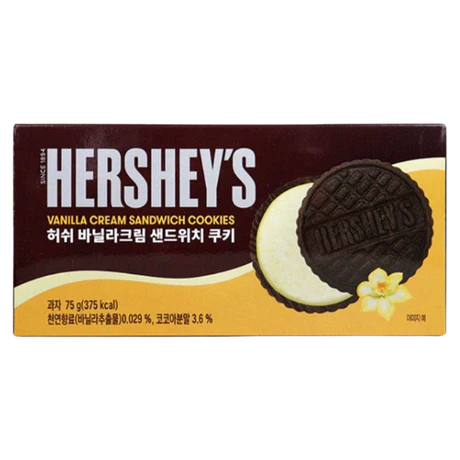 Front of Hershey's Vanilla Cream Sandwich Cookies pack showing rich chocolate cookies with vanilla cream filling, 75g pack size