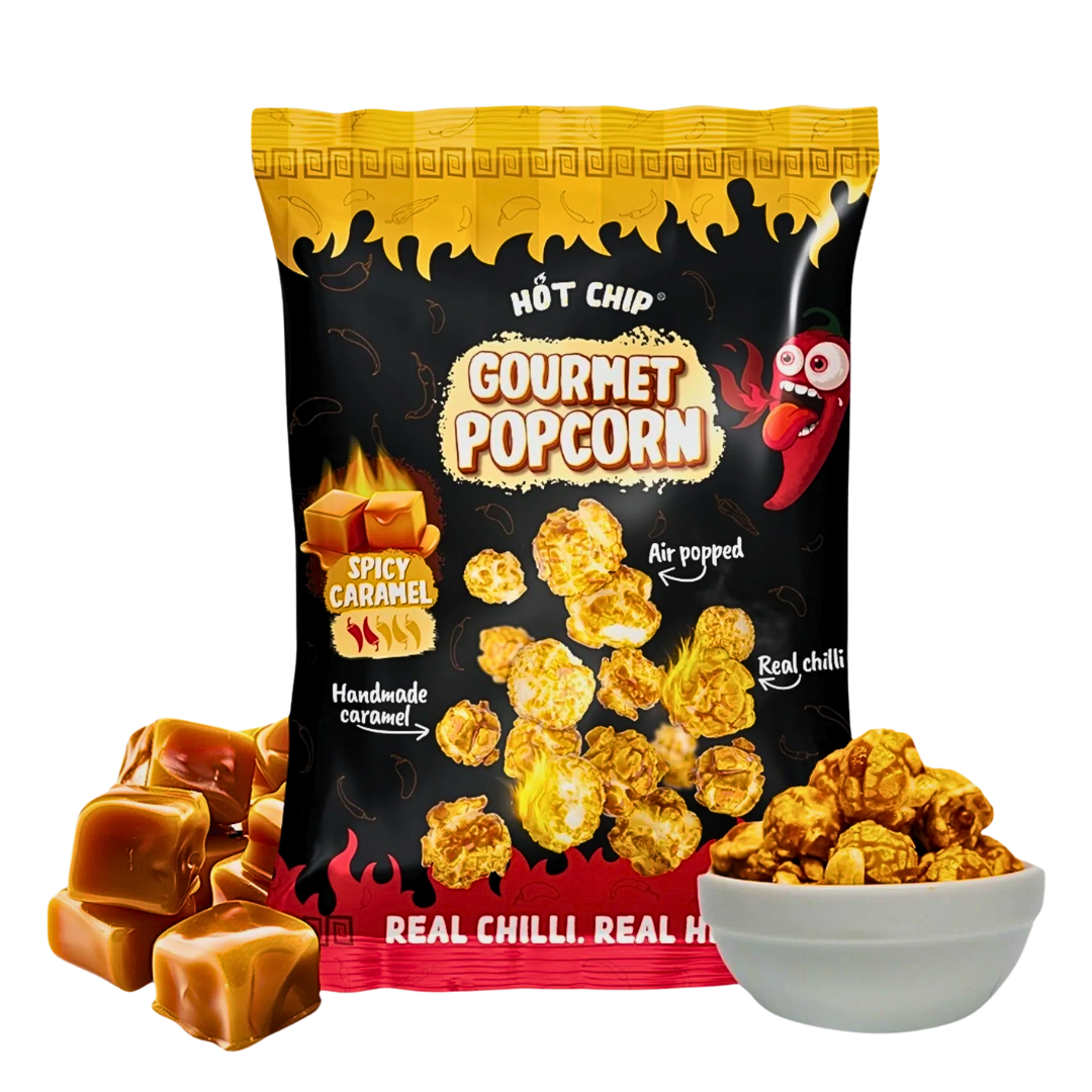 Front of Hot Chip Gourmet Popcorn Spicy Caramel bag showing the logo, spicy caramel label, and image of popcorn with caramel pieces (120g pack)