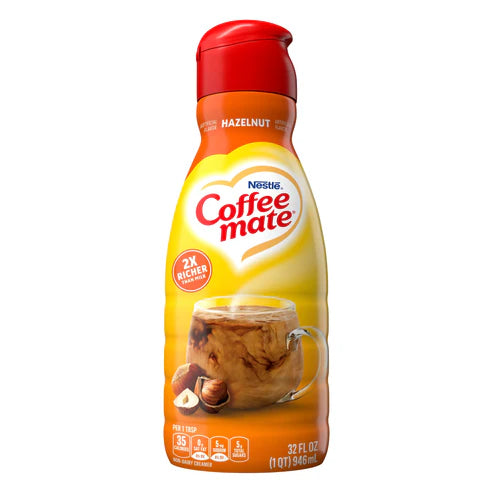 Front of Coffee-Mate Hazelnut Liquid Creamer bottle showing logo, hazelnut flavour label, and pack size (946ml)