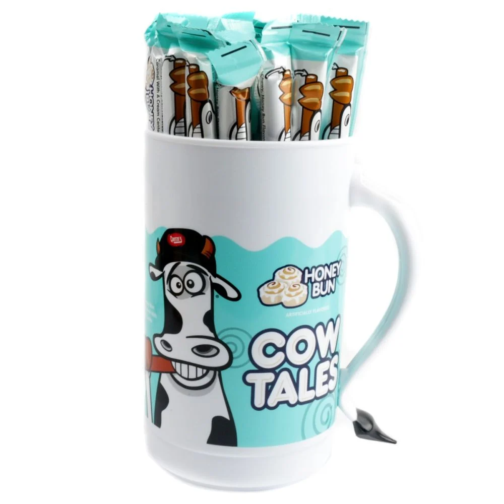 Front of Cow Tales Honey Bun Branded Tumbler featuring a playful cow design, Honey Bun logo, and an assortment of chewy Cow Tales snacks inside.