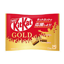 Front of Kit Kat Gold (Japan) packaging showing the logo, golden design, and images of the chocolate wafer bar (127g pack)