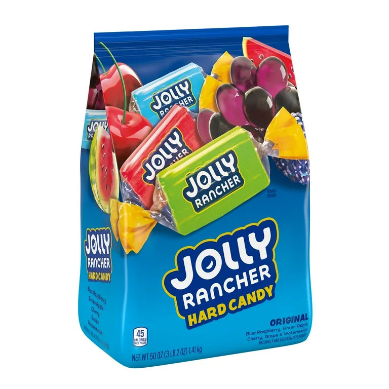 Front of a blue bag of Jolly Rancher Hard Assorted Candy BIG BAG with colourful candies shown inside and labels for flavours (1410g)