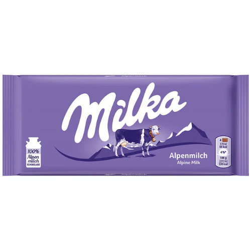 Front of Milka Alpine chocolate bar showing purple packaging with logo, Alpine milk claim, and landscape imagery (100g pack)