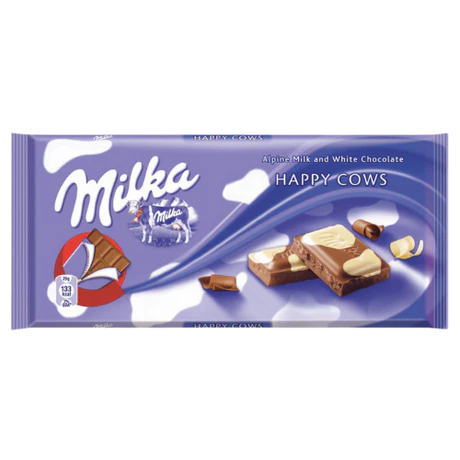 Front of Milka Happy Cow (90g) wrapper featuring the logo, smooth alpine milk and white chocolate imagery, and playful cow design.