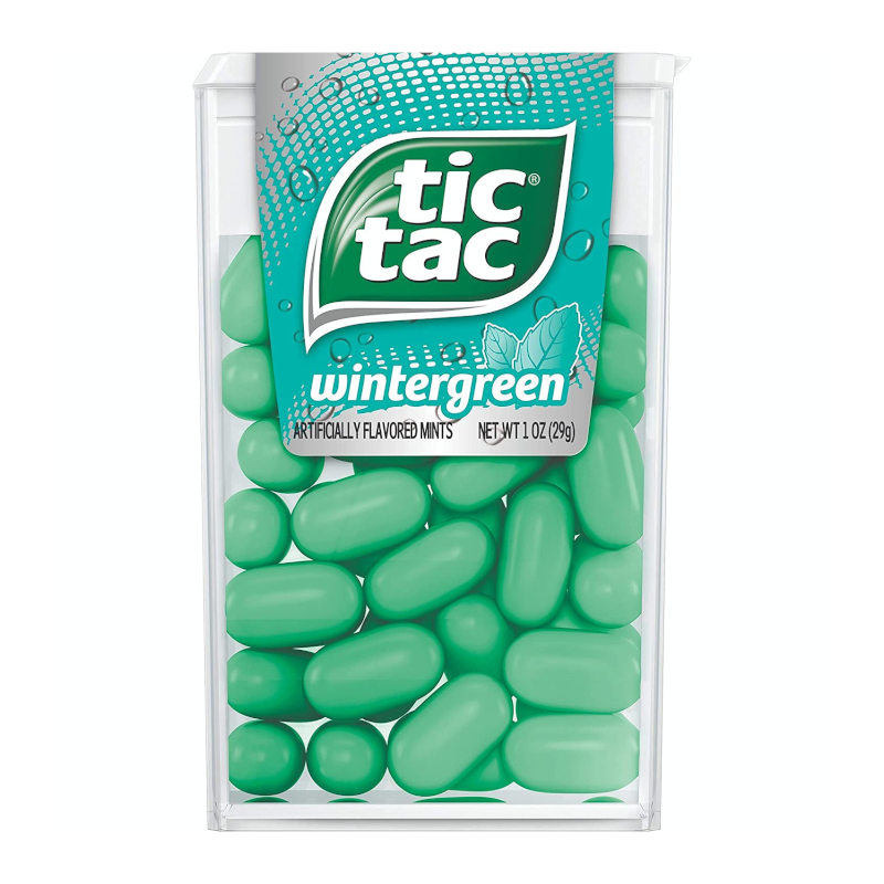 Front of Tic Tac Wintergreen pack showing the logo, wintergreen flavour label, and mint pieces inside (29g pack)