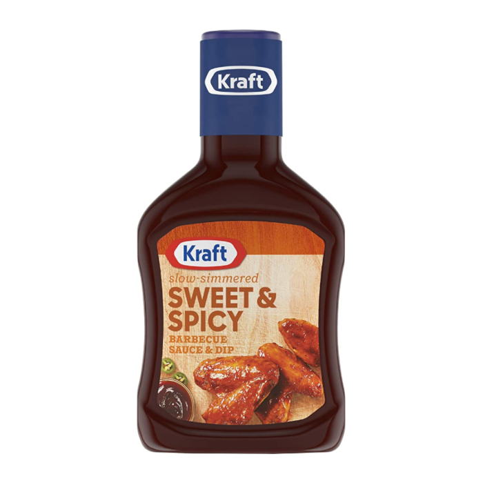 Front of Kraft Sweet & Spicy Barbeque Sauce bottle showing logo, sweet & spicy label, and image of coated wings (510g)