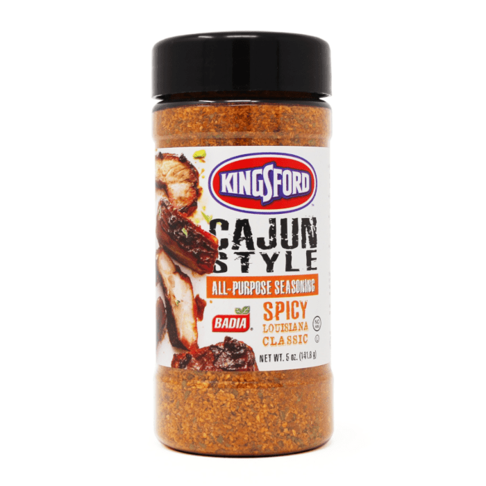 Front of Badia Kingsford Cajun Style All-Purpose Seasoning bottle showing logo, spicy seasoning label, and images of grilled meat (141.8g)
