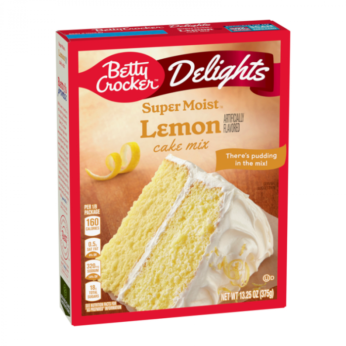 Front of Betty Crocker Delights Super Moist Lemon Cake Mix box showing lemon flavour label, cake image, and 375g pack size