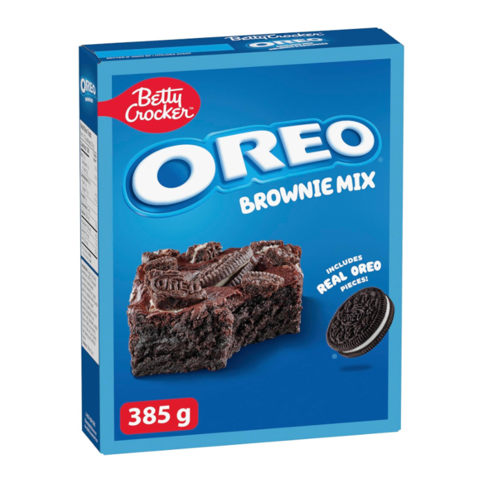 Front of Oreo Brownie Cake Mix box showing logo, brownie image with real Oreo pieces, and 385g pack size.