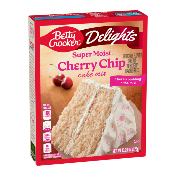 Front of Betty Crocker Delights Super Moist Cherry Chip Cake Mix box showing logo, cherry chip flavour, and image of cake (375g pack)