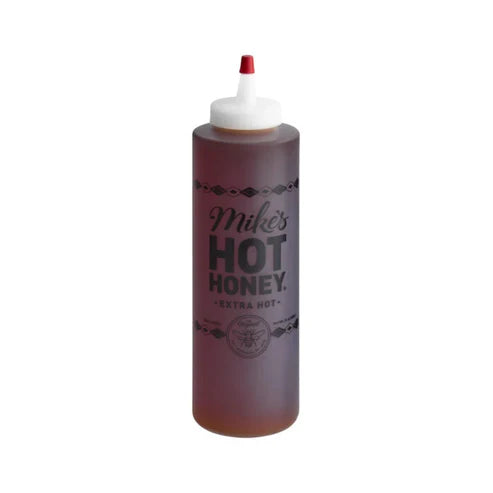 Front of Mike's Hot Honey Extra Hot bottle featuring the brand name, extra hot label, and 709ml size.