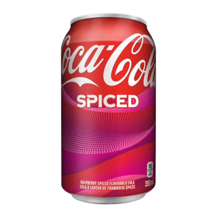 Front of Coca Cola Raspberry Spiced can showing red and pink design, Coca Cola logo, raspberry flavour text, and 355ml size indication.