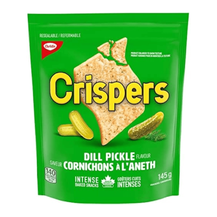 Front of Crispers Dill Pickle Crackers bag showing vibrant green packaging, brand logo, dill pickle flavour visual, and 145g pack size.