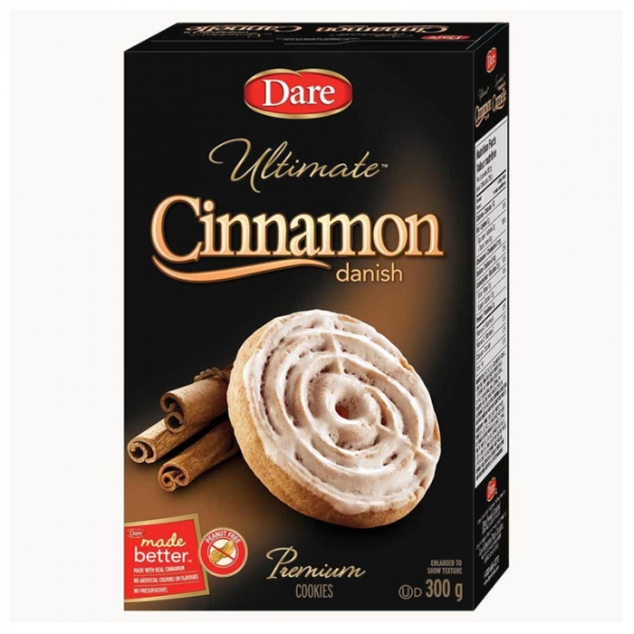 Front of Dare Ultimate Cinnamon Danish Premium Cookies box featuring the logo, cinnamon-danish cookie image, and 300g pack size