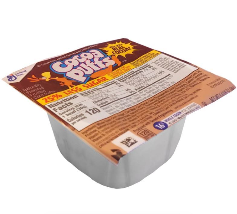 Front of Cocoa Puffs Cereal Cup showing the logo, colourful cocoa puffs, and the 30g cup size