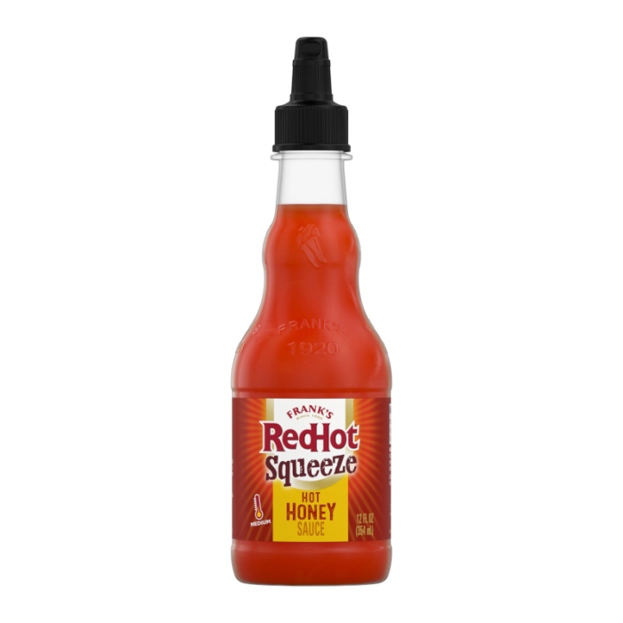 Front of Frank's Red Hot Squeeze Hot Honey Sauce bottle showing red and yellow label, logo, and information about the 354ml pack size.