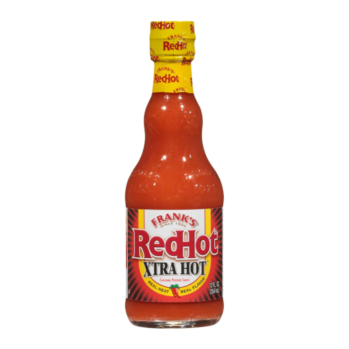 Front of Frank's RedHot Xtra Hot Sauce bottle showing bold brand logo, red sauce, and pack size (354ml)