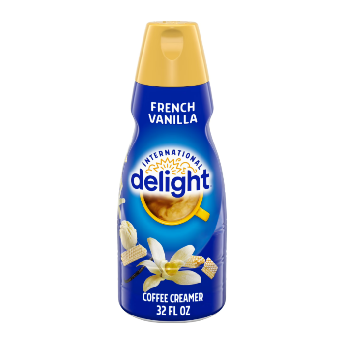 Front of International Delight Coffee Creamer French Vanilla bottle with logo and vanilla flower design (946ml)