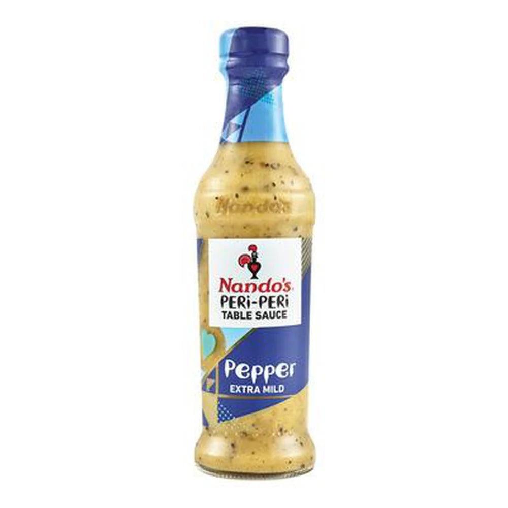 Front of Nando's Creamy Pepper Sauce bottle showing the logo, creamy texture, and details (250g)