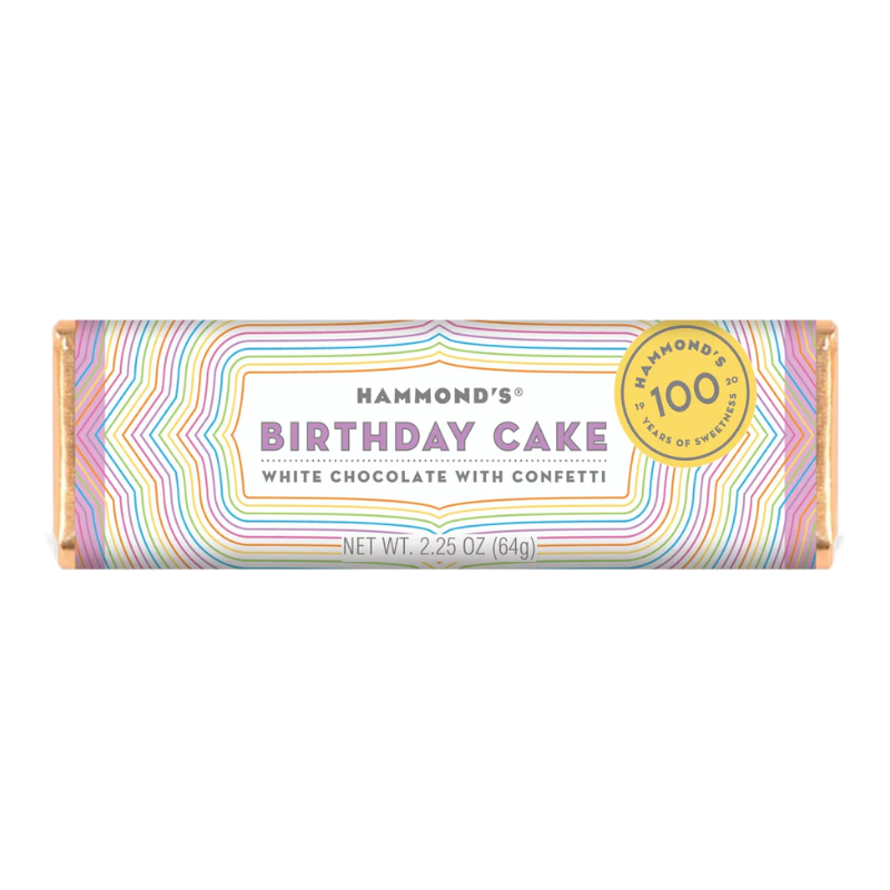 Front of Hammond's Birthday Cake White Chocolate Bar showing vibrant design with label, fun confetti detail, and pack size (64g)