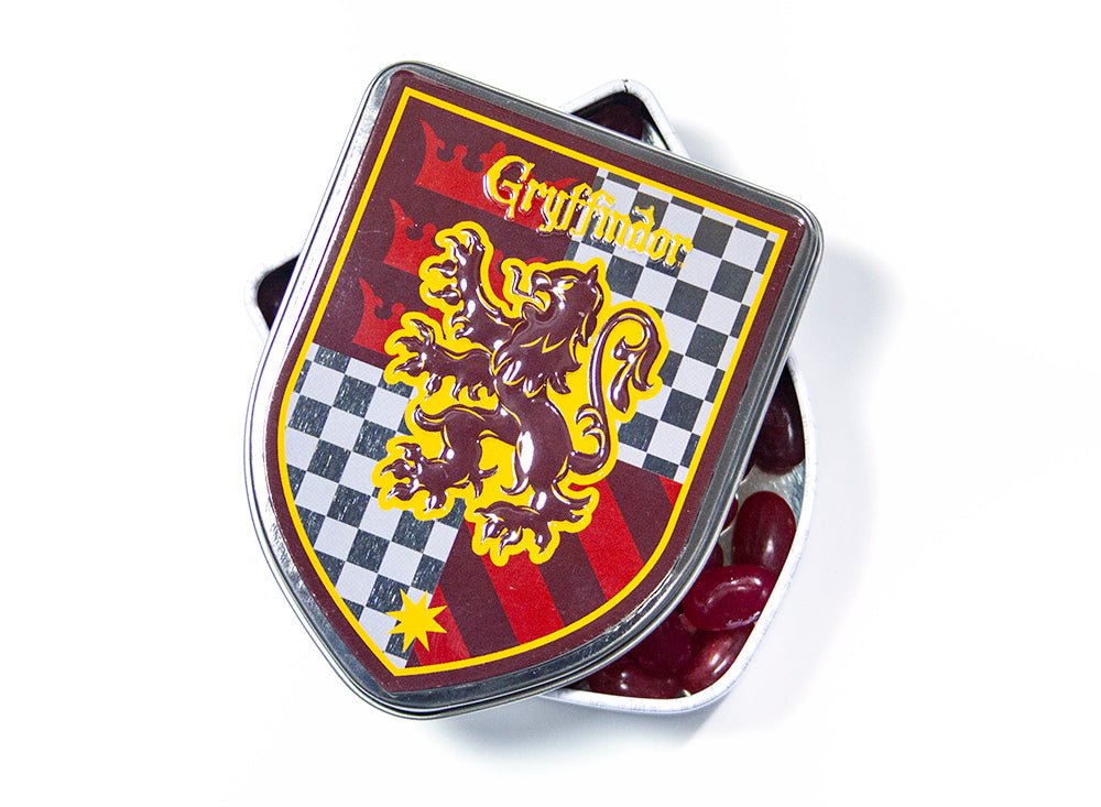 Front of Harry Potter GRYFFINDOR Crest Tin showing the crest design and jelly beans inside (28g pack)