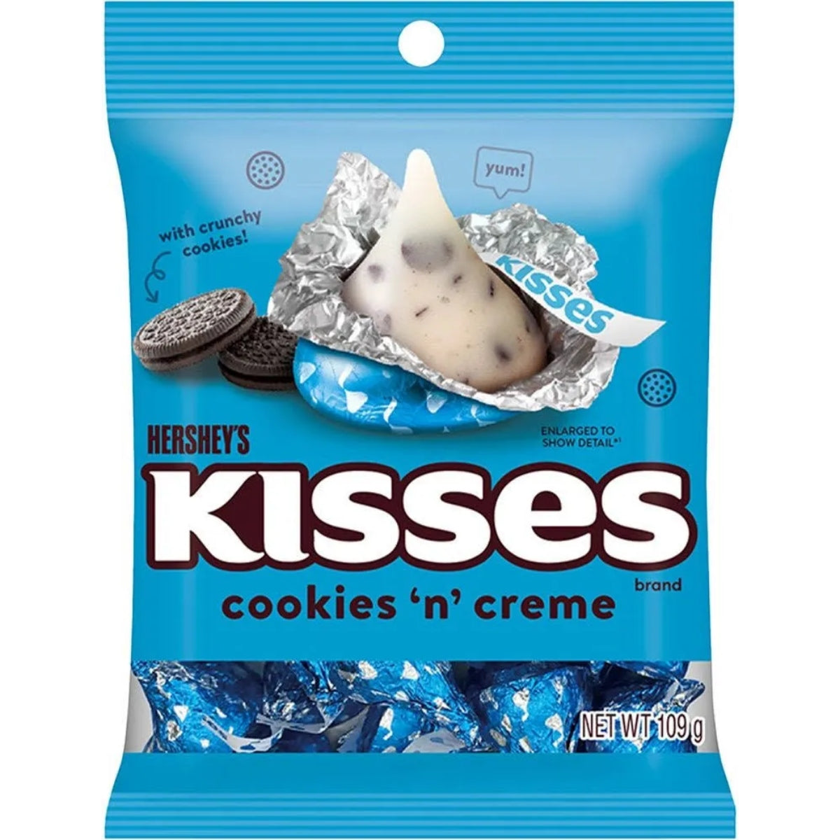 Front of Hershey's Kisses Cookies N Creme bag featuring creamy chocolate kisses with crunchy cookie pieces and 62g pack label.