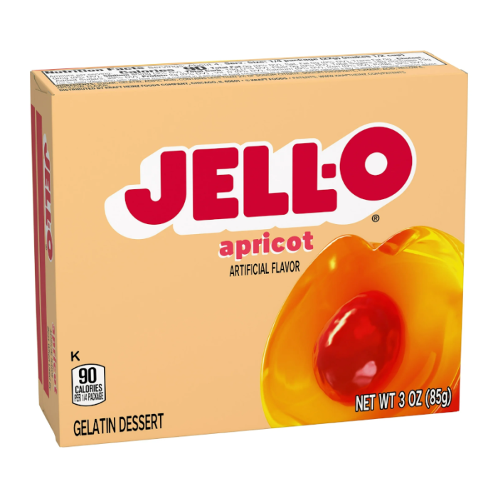 Box of Jell-O apricot flavor on a white background