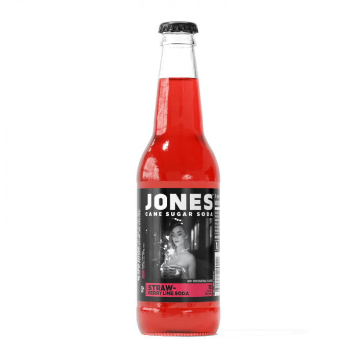 Front of Jones Soda Strawberry Lime bottle showcasing logo, vibrant red colour, and 355ml pack size.