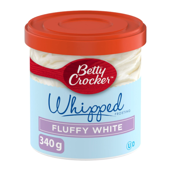 Front of Betty Crocker Whipped Frosting Fluffy White container showing brand logo, fluffy white frosting label, and 340g size.