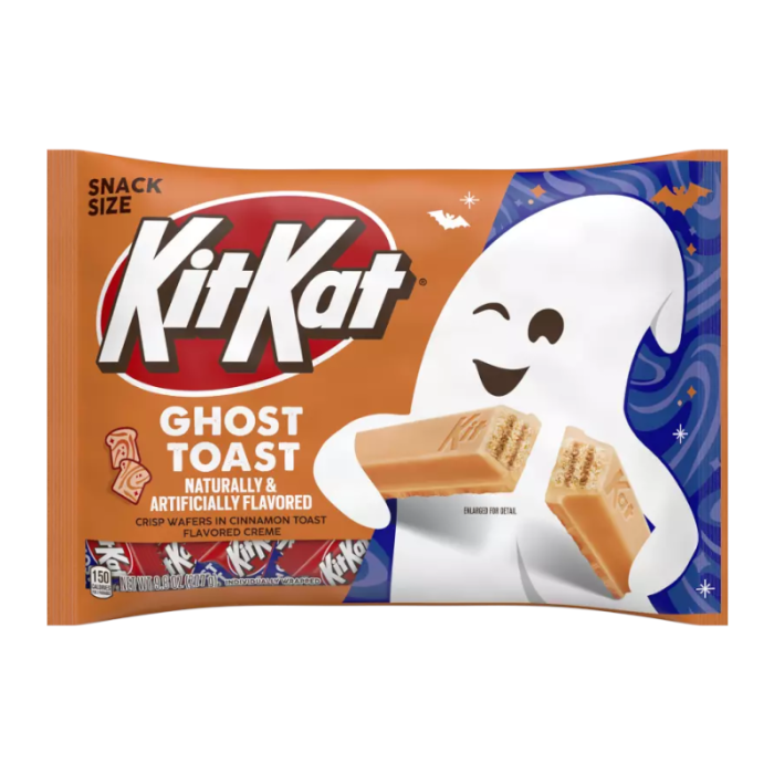 Front of Kit Kat Ghost Toast Snack Size (277g) packaging featuring a playful ghost, cinnamon toast flavour, and bright orange background with the Kit Kat logo.