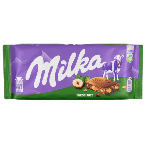 Front of Milka Hazelnut chocolate bar featuring the Milka logo, hazelnut image, and 90g pack size.