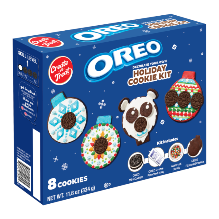 Front of Oreo Decorate Your Own Holiday Cookie Kit box showing festive designs and colourful icing, includes 8 cookies in a 334g pack.