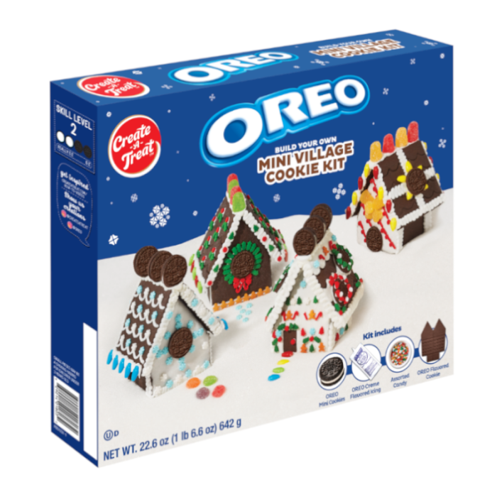 Front of Oreo Build Your Own Mini Village Cookie Kit showing the blue logo, cookie village houses, and decorative toppings (642g pack)