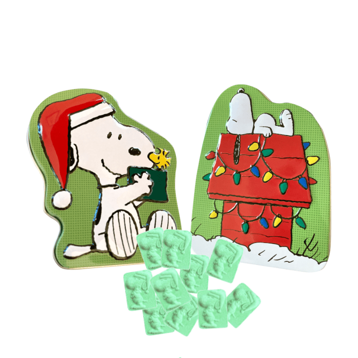 Front of Peanuts Christmas is Giving Tin showcasing festive design and characters (42g)
