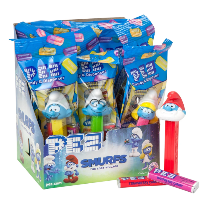 Front of Pez Candy Dispenser Smurfs Poly Packs showing colourful dispensers featuring Smurfs characters and strawberry and raspberry candy (24.7g)