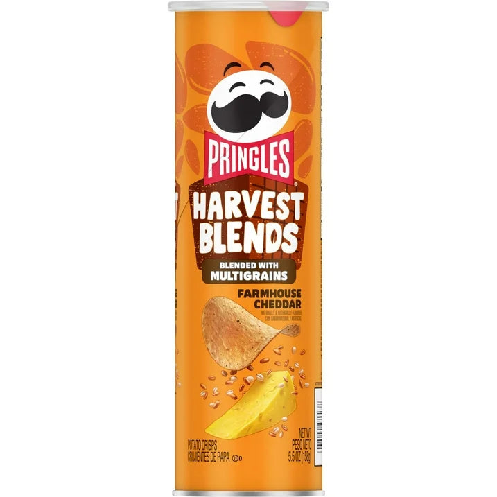 Front of Pringles Harvest Blends Farmhouse Cheddar can showing logo, blended with multigrains label, and image of potato crisps (155.9g pack)