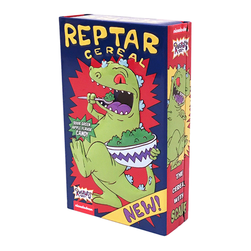 Front of Rugrats Reptar Cereal Candy Tin showing vibrant design, Reptar character, and sour green apple flavour label (34g tin)
