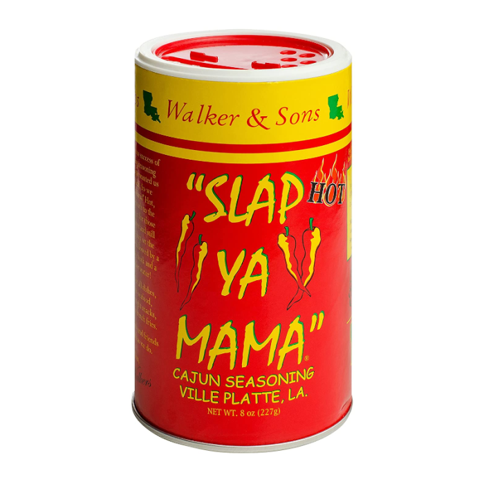 Front of Slap Ya Mama Cajun Hot Seasoning Blend showing bold red and yellow label with logo, hot seasoning visuals, and 227g pack size